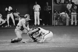 American League's Brian Downing of the California Angels is tagged out at the plate by Gary Carter in the 8th at the Kingdome in Seattle, July 17, 1979. Downing was trying to score from second on a hit by Graig Nettles of the Yankees when thrown out by right fielder Dave Parker. National League won the game 7-6 in the longest nine inning All-Star game in history. (AP Photo)