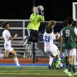 Edmonds-Woodways Gabriel Wilhelm (center). (Olivia Vanni / The Herald)
