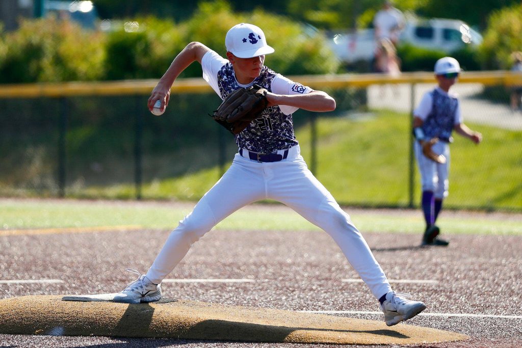 Lake Stevens All Star Joel Dellino deals a pitch against Everett during a 12u Little League matchup on Wednesday, July 5, 2023, at the Phil Johnson Ballfields in Everett, Washington. (Ryan Berry / The Herald)