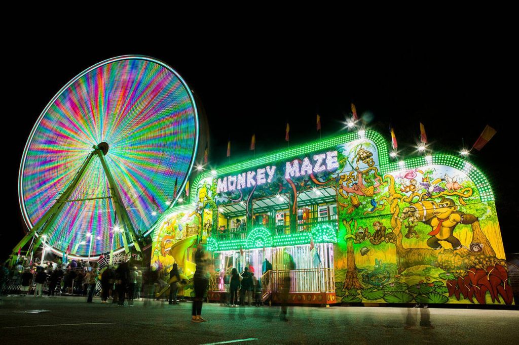Rides at night at the Evergreen State Fair on Aug. 24, 2018 in Monroe, Wa. (Olivia Vanni / The Herald)