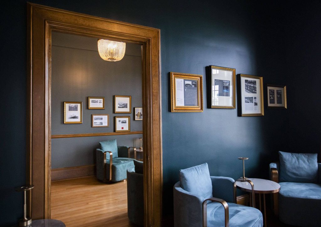 A view of the multiple sitting rooms available at the Muse Whiskey & Coffee Bar on Wednesday, July 12, 2023 in Everett, Washington. (Olivia Vanni / The Herald)