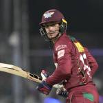 Lucknow Super Giants' Quinton de Kock watches his shot during the Indian Premier League cricket match between Kolkata Knight Riders and Lucknow Super Giants in Kolkata, India, Saturday, May 20, 2023. (AP Photo/Bikas Das)