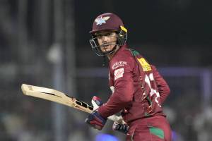 Lucknow Super Giants' Quinton de Kock watches his shot during the Indian Premier League cricket match between Kolkata Knight Riders and Lucknow Super Giants in Kolkata, India, Saturday, May 20, 2023. (AP Photo/Bikas Das)