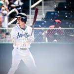 AquaSox Cole Young smiles as he steps up to bat during the game against the Tri-City Dust Devils on Wednesday, July 19, 2023 in Everett, Washington. (Olivia Vanni / The Herald)