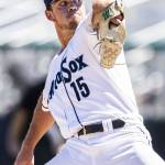 AquaSox pitchers Kyle Hill winds up to pitch during the game against the Tri-City Dust Devils on Wednesday, July 19, 2023 in Everett, Washington. (Olivia Vanni / The Herald)