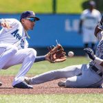AquaSox second baseman Axel Sanchez tags out Tri-City’s D’Shawn Knowles during the game on Wednesday, July 19, 2023 in Everett, Washington. (Olivia Vanni / The Herald)