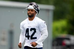 Seattle Seahawks linebacker Cam Bright (42) jogs off the field after participating in team activities Monday, May 22, 2023, at the team's NFL football training facility in Renton, Wash. (AP Photo/Lindsey Wasson)