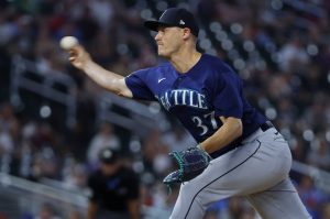 Mariners relief pitcher Paul Sewald throws to the Twins in the 10th inning of a game Monday in Minneapolis. (AP Photo/Bruce Kluckhohn)