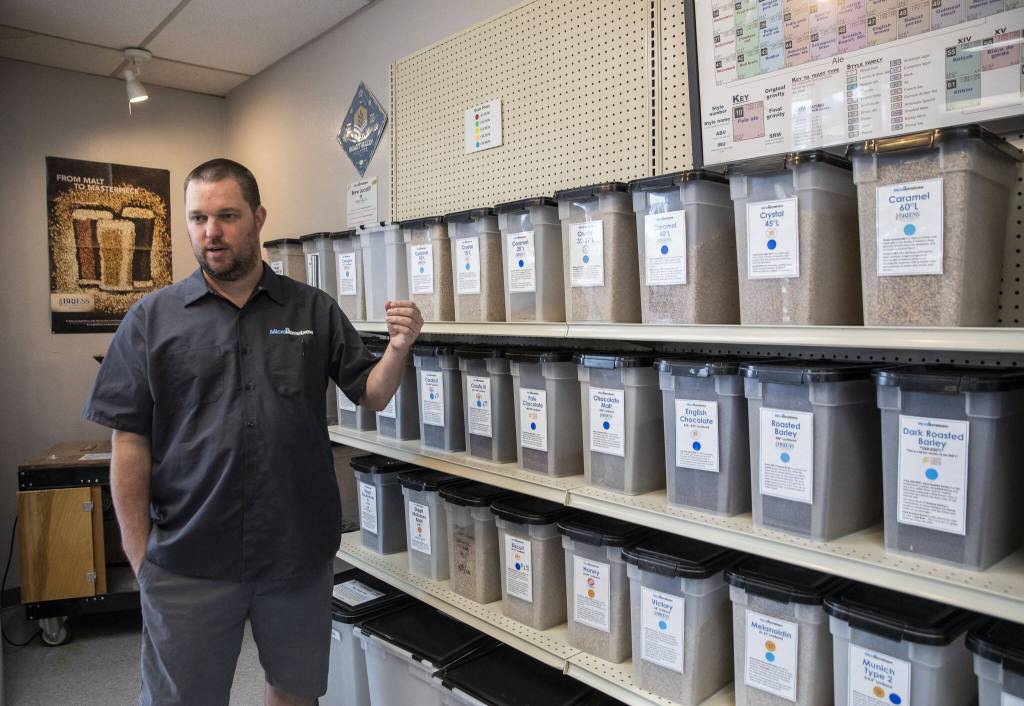 Corey DeJong talks about their grain selection on Monday, Aug. 7, 2023 in Kenmore, Washington. (Olivia Vanni / The Herald)