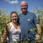 Sarah Ricci, left, and Bob Ricci, right pose for a photo at Bobs Corn and Pumpkin Farm in Snohomish, Washington on Thursday, July 27, 2023. (Annie Barker / The Herald)