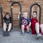 From left, siblings Mason Boucher, 8, Karter Boucher, 2, and Mia Boucher, 9. On Wednesday, the family will will have to leave the shelter and move into their van. (Annie Barker / The Herald)