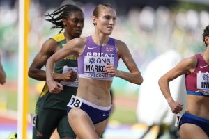 Amy-Eloise Markovc, of Britain, competes during a heat in the women's 5000-meter run at the World Athletics Championships on Wednesday, July 20, 2022, in Eugene, Ore. (AP Photo/Ashley Landis)