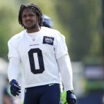 Seahawks linebacker Devin Bush walks off the field following a practice on Sunday in Renton. (AP Photo/Lindsey Wasson)