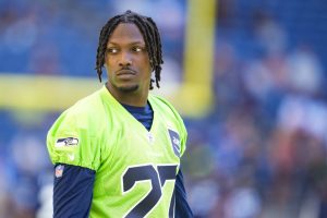 Seattle Seahawks cornerback Riq Woolen stands on the sideline during warmups before the NFL football team's mock game, Friday, Aug. 4, 2023, in Seattle. (AP Photo/Lindsey Wasson)