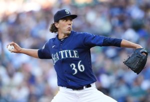 Mariners starting pitcher Logan Gilbert throws against the Padres during the first inning of a game Tuesday in Seattle. (AP Photo/Lindsey Wasson)