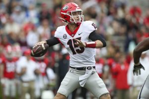 Georgia quarterback Carson Beck throws in the first half of Georgias spring game April 16, 2022, in Athens, Ga. Coach Kirby Smart has made it clear that Carson Beck is the quarterback to beat. (AP Photo/Brett Davis, File)