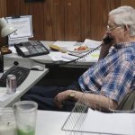 Eric Meyer, editor and publisher of the Marion (Kan.) County Record, speaks Monday during a telephone interview with a British radio station about the raid Friday on his newspapers offices and his home by local police. (John Hanna / Associated Press)