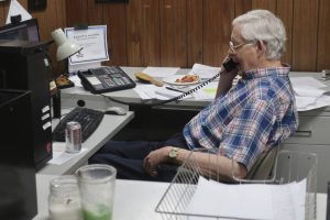 Eric Meyer, publishers of Marion, Kansas, County Record, has a telephone interview with a British radio station about the raid on his newspaper's offices and his home by local police, Monday, Aug. 14, 2023, in Marion, Kan.  (AP Photo/John Hanna)