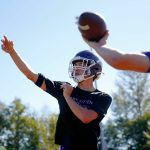 Lake Stevens junior quarterback Kolton Matson throws alongside the other quarterbacks during the Vikings first practice of the year Wednesday, August 16, 2023, in Lake Stevens, Washington. (Ryan Berry / The Herald)