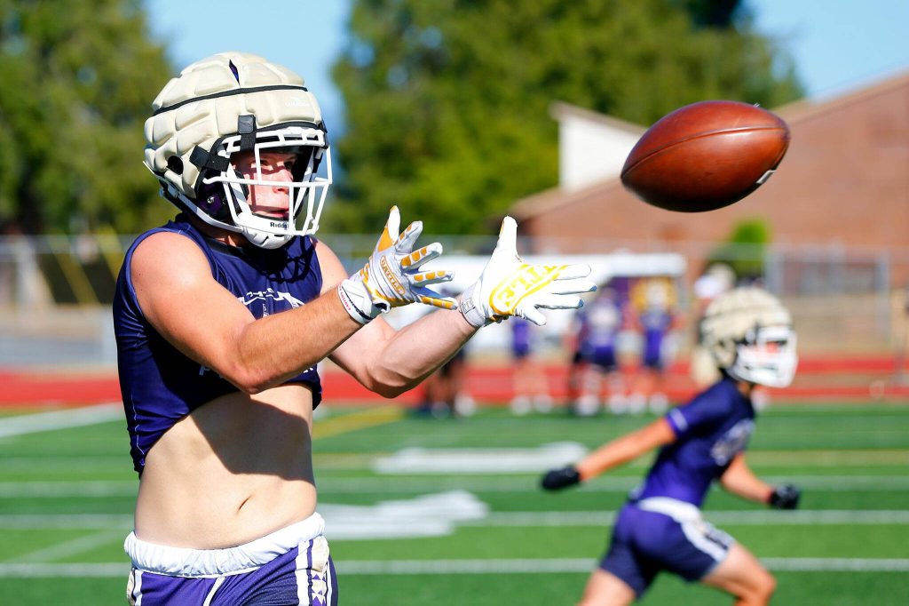 Lake Stevens receivers and running backs run routes during the Vikings first practice of the year Wednesday, August 16, 2023, in Lake Stevens, Washington. (Ryan Berry / The Herald)