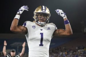 FILE - Washington wide receiver Rome Odunze (1) celebrates his touchdown catch against UCLA during the first half of an NCAA college football game Friday, Sept. 30, 2022, in Pasadena, Calif. Washington opens their season at home against Boise State on Sept. 2. (AP Photo/Marcio Jose Sanchez, File)