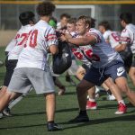 Logan Hansen (85), right, runs a play during a football practice Thursday at Mountlake Terrace High School. (Annie Barker / The Herald)