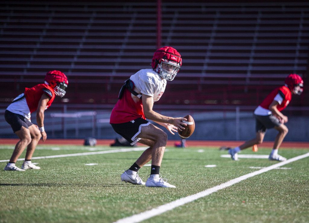 Stanwoods Luke Brennan runs through a drill during practice on Friday, Aug. 18, 2023 in Stanwood, Washington. (Olivia Vanni / The Herald)