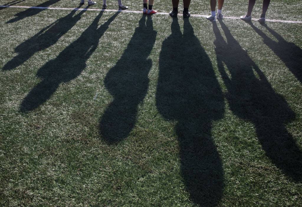 Stanwood players lineup to run a play during practice on Friday, Aug. 18, 2023 in Stanwood, Washington. (Olivia Vanni / The Herald)