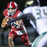 Marysville Pilchucks Kenai Sinaphet reaches out to try and cross into the end zone for a touchdown during a game against Maryville Getchell on Sept. 16, 2022, in Marysville. (Olivia Vanni / The Herald)