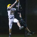 Ferndales Conner Walcker leaps up to make a catch against Monroe on Oct. 28, 2022, in Monroe. (Olivia Vanni / The Herald)