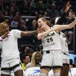 The Chicago Sky bench reacts to a teammates three-point shot during the game against the Seattle Storm at Climate Pledge Arena on Sunday, Aug. 27, 2023 in Seattle, Washington. (Olivia Vanni / The Herald)