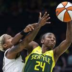 Seattle Storms Jewell Loyd reaches out for the ball /while being guarded by Chicago Skys Courtney Williams during the game at Climate Pledge Arena on Sunday, Aug. 27, 2023 in Seattle, Washington. (Olivia Vanni / The Herald)