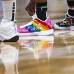 Seattle Storms Jordan Horston adjust their laces during the game against the Chicago Sky at Climate Pledge Arena on Sunday, Aug. 27, 2023 in Seattle, Washington. (Olivia Vanni / The Herald)