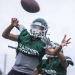 Edmonds-Woodways David Danyo reaches out to catch a pass during practice on Monday in Edmonds. (Olivia Vanni / The Herald)