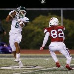 Edmonds-Woodways Jesse Hart comes down with a long reception during a game against Snohomish on Sept. 23, 2022, at Veterans Memorial Stadium in Snohomish. (Ryan Berry / The Herald)