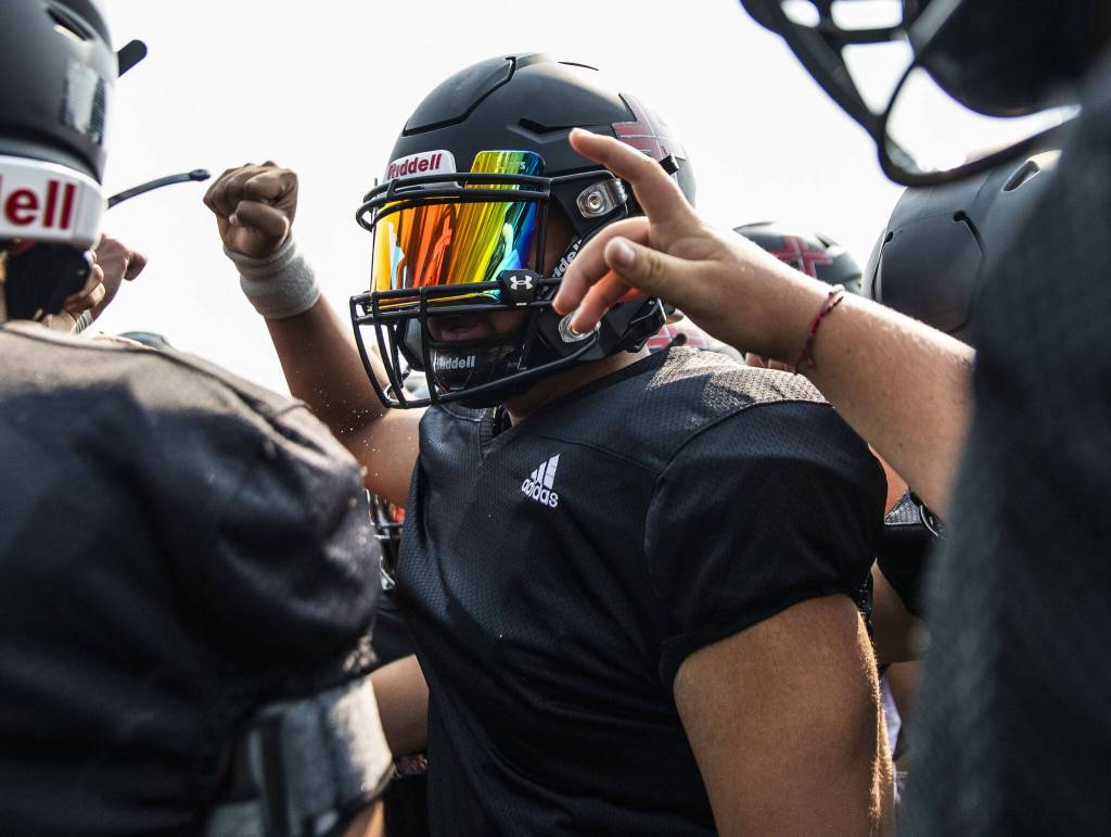 Archbishop Murphy’s Jovin Shoker leads the team in a cheer during practice on Thursday, Aug. 24, 2023 in Everett, Washington. (Olivia Vanni / The Herald)