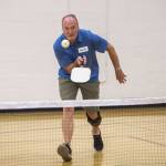 Scott Hyde hustles to return a serve in Edmonds. (Olivia Vanni / The Herald)