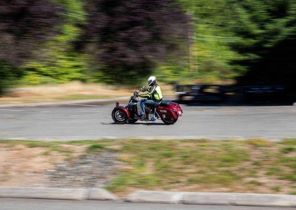 Bill Messing takes the prototype for a quick demonstration ride around the parking lot on Wednesday, Aug. 16, 2023 in Granite Falls, Washington. (Olivia Vanni / The Herald)