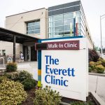 A person walks out of the Everett Clinic on Thursday, Sept. 7, 2023 in Everett, Washington. (Olivia Vanni / The Herald)