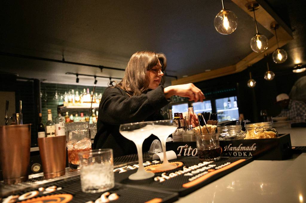 The cocktail menu is lengthy and diverse at 16Eleven, pictured Wednesday, August 23, 2023, in downtown Everett, Washington, offers a spectrum of options. (Ryan Berry / The Herald)