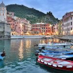 Enjoy a sunset stroll along Vernazzas breakwater at dusk when colors deepen and glow. (Rick Steves Europe)