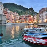 Enjoy a sunset stroll along Vernazza’s breakwater at dusk when colors deepen and glow. (Rick Steves’ Europe)