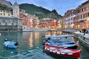 Enjoy a sunset stroll along Vernazza’s breakwater at dusk when colors deepen and glow. (Rick Steves’ Europe)