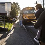 Parents walk with their children to Whittier Elementary on Wednesday, Sept. 6, 2023 in Everett, Washington. (Olivia Vanni / The Herald)