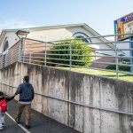 A parent walks their children to class at Whittier Elementary on Wednesday, Sept. 6, 2023 in Everett, Washington. (Olivia Vanni / The Herald)