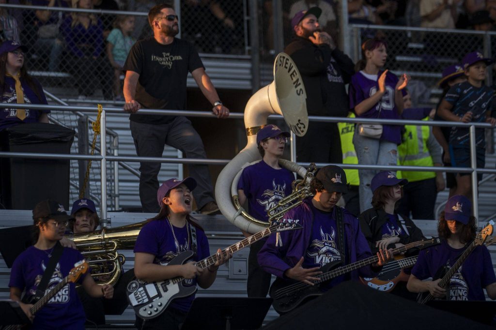 The Lake Stevens marching band performs during a football game between Lake Stevens and Garfield at Lake Stevens High School in Lake Stevens, Washington on Friday, Sept. 1, 2023. The Vikings won 48-21.. (Annie Barker / The Herald)