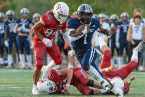 Glacier Peak's Chrisvin Bonshe (1) slips past the defense during a game against Snohomish on Sept, 1, 2023, at Snohomish High School. (John Gardner / Pro Action Image)
