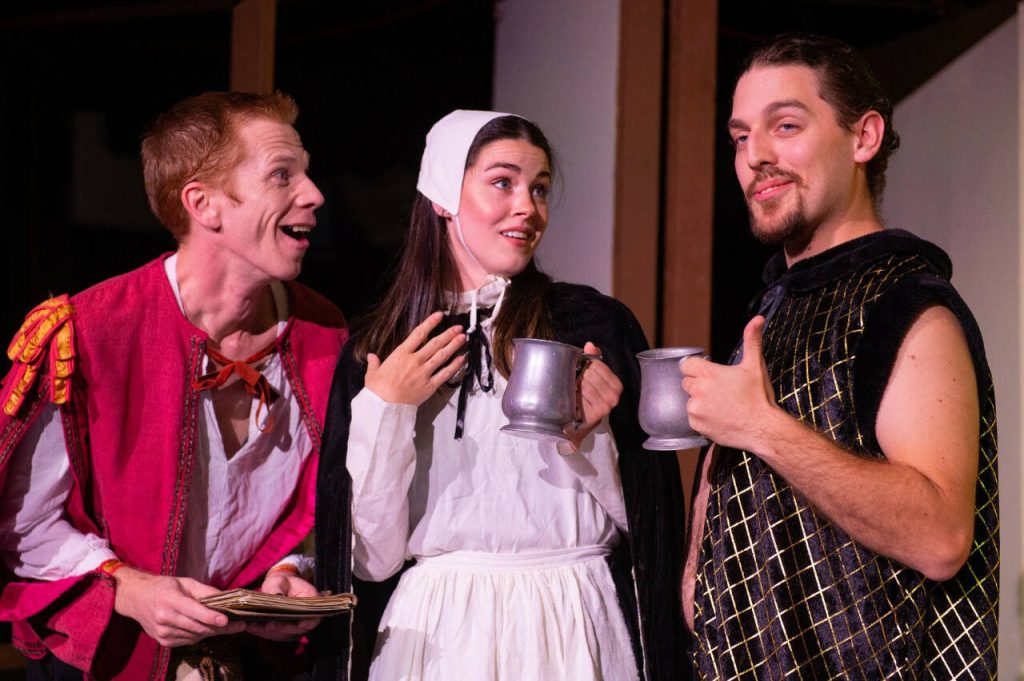 Nigel Bottom (left, played by Jonathan Olson) introduces a smitten Portia (Katie Wallace) to Shakespeare (Josiah Miller) in Something Rotten! (Kenny Randall)