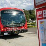 An Everett Transit Route 6 bus arrives at the 13th Street stop near the Port of Everett Monday, Aug. 1, 2022, in Everett, Washington. (Ryan Berry / The Herald)