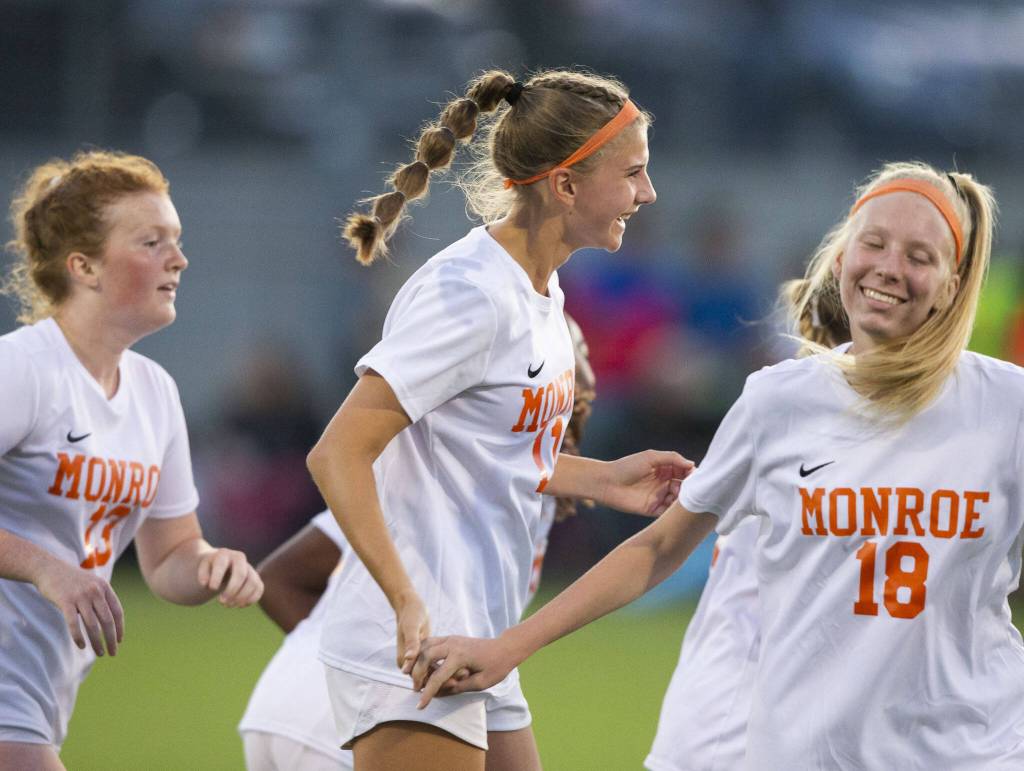 Monroes Sydney Garner celebrates her goal with her teammates during the game Everett on Thursday, Sept. 7, 2023 in Everett, Washington. (Olivia Vanni / The Herald)